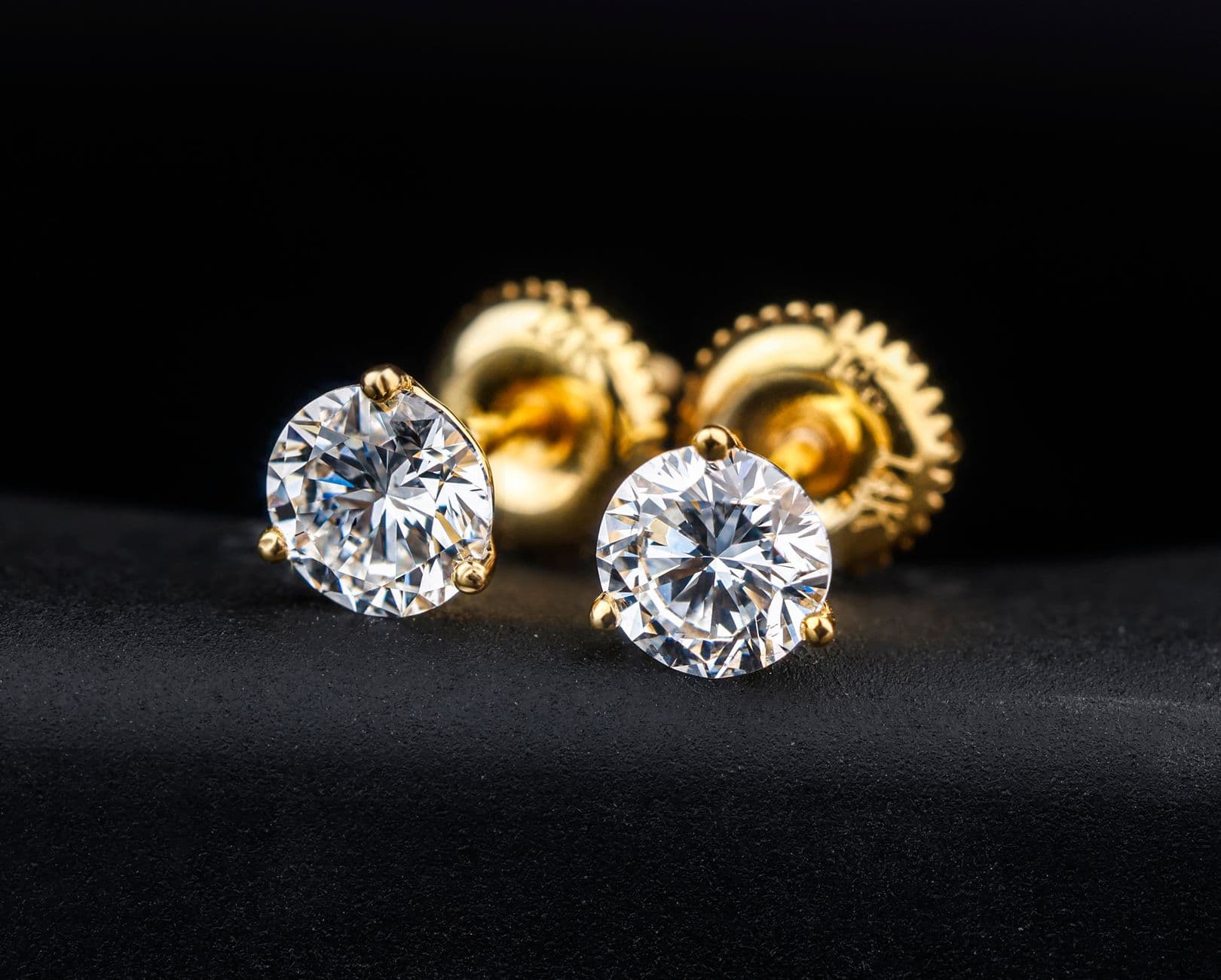 Diamond stud earrings on display